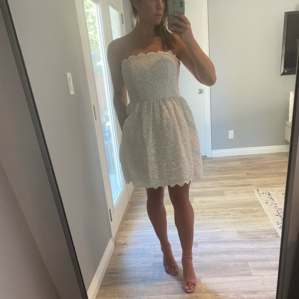 Jill Stuart - pretty white lace dress that hits mid thigh.